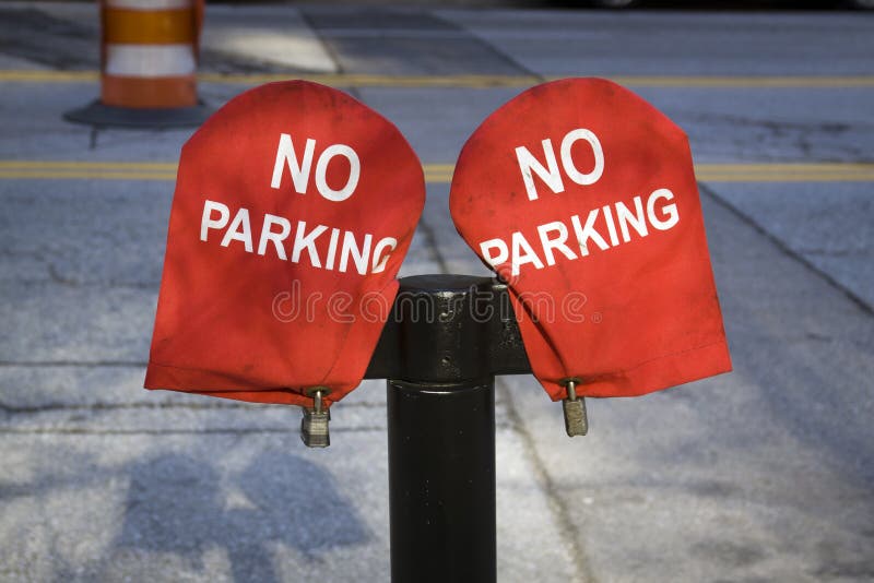 No Parking Sign on red material