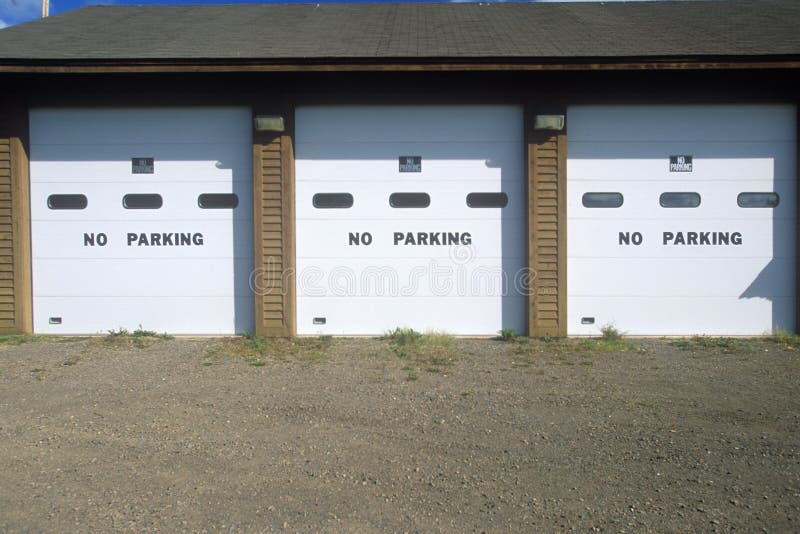 No Parking Signs on a Garage Door Editorial Photo Image of north