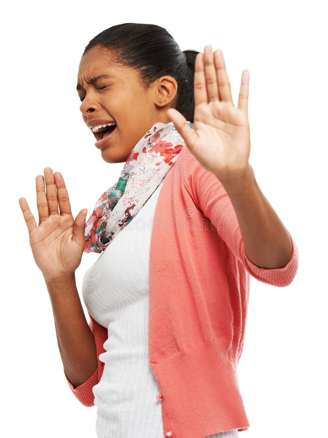 No please dont. A young woman looking scared and gesturing for you stop. stock image
