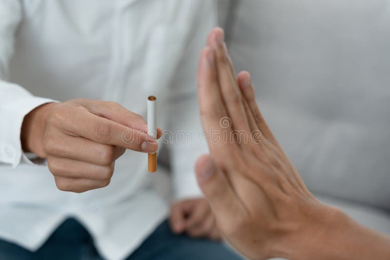 No smoking. Man stop smoke, refuse, reject, destroy, smash cigarette, say no. quit smoking for health. world tobacco day. drugs