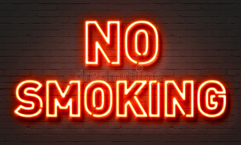 No smoking neon sign on brick wall background.