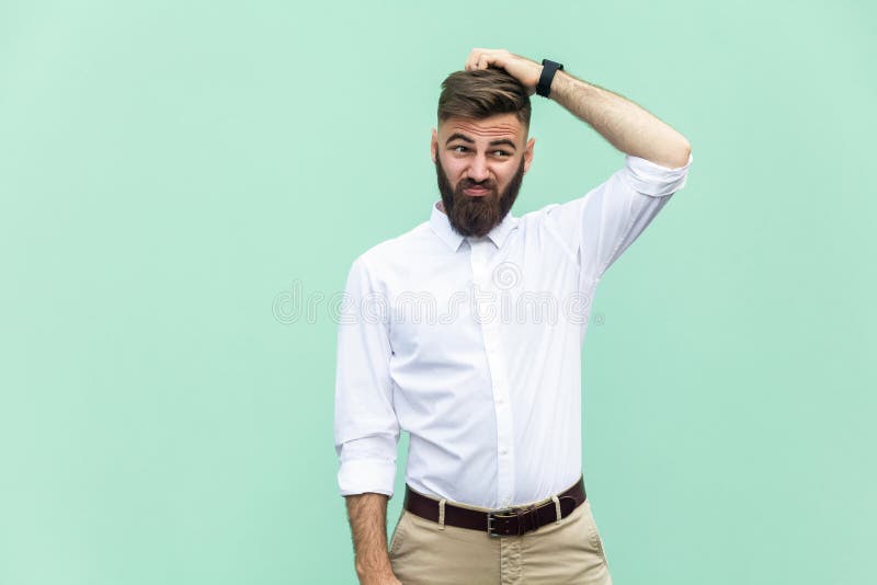 No sure El hombre de negocios adulto joven tiene una duda fotografía de archivo libre de regalías No sure El hombre de negocios adulto joven tiene una duda fotografía de archivo libre de regalías
