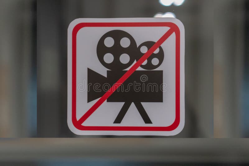 No tome la muestra de las fotos muestra ningún vídeo permitido en fondo gris imagen de archivo No tome la muestra de las fotos muestra ningún vídeo permitido en fondo gris imagen de archivo