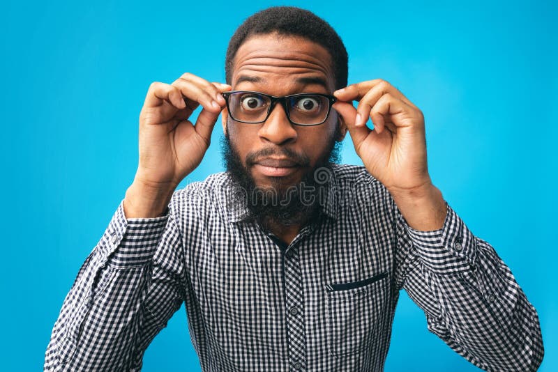 nødvendig repulsion Examen album Surprised African American Guy Touching His Eyewear Stock Photo - Image of  emotional, portrait: 184086316