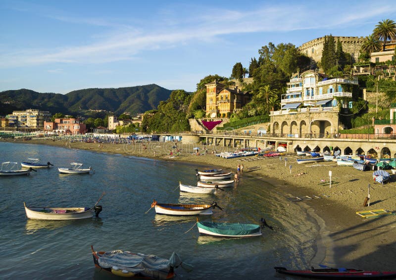 LEVANTO, LA SPEZIA, ITALY - JUNE 26, 2015. Evening on the Ligurian beach at Levanto, La Spezia. LEVANTO, LA SPEZIA, ITALY - JUNE 26, 2015. Evening on the Ligurian beach at Levanto, La Spezia.