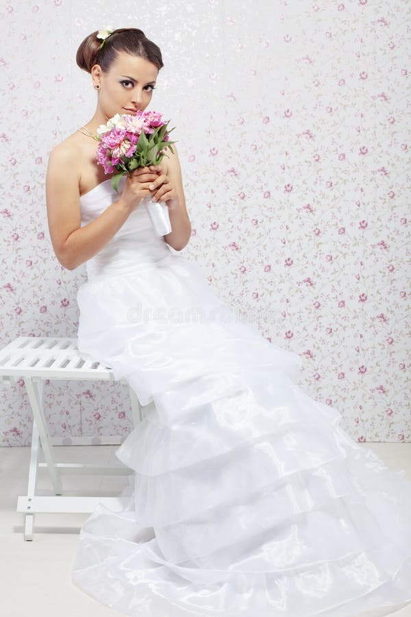 Beautiful young bride wearing fashion wedding dress. Beautiful young bride wearing fashion wedding dress
