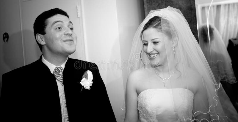 Bride and Groom smiling. Bride and Groom smiling