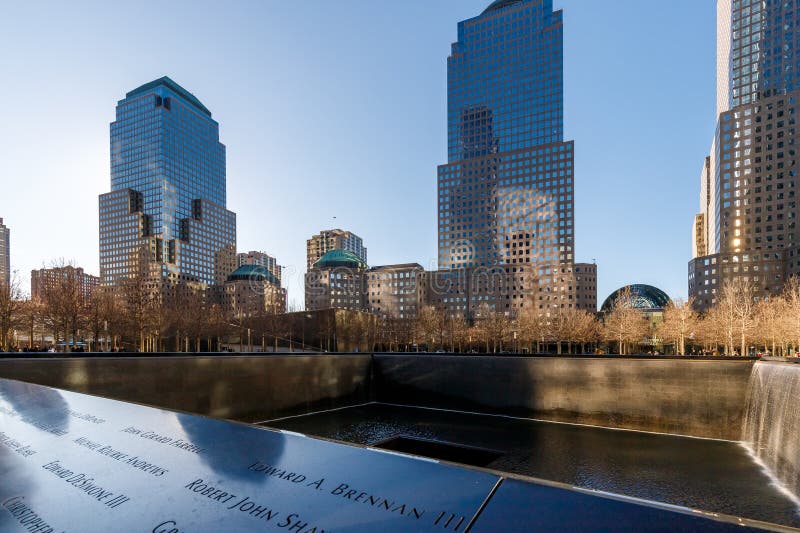 New York City, USA - February 11, 2023 - World Trade Center Memorial, Ground Zero. The memorial was dedicated on the 10th anniversary of the Sept. 11, 2001 attacks. New York City, USA - February 11, 2023 - World Trade Center Memorial, Ground Zero. The memorial was dedicated on the 10th anniversary of the Sept. 11, 2001 attacks