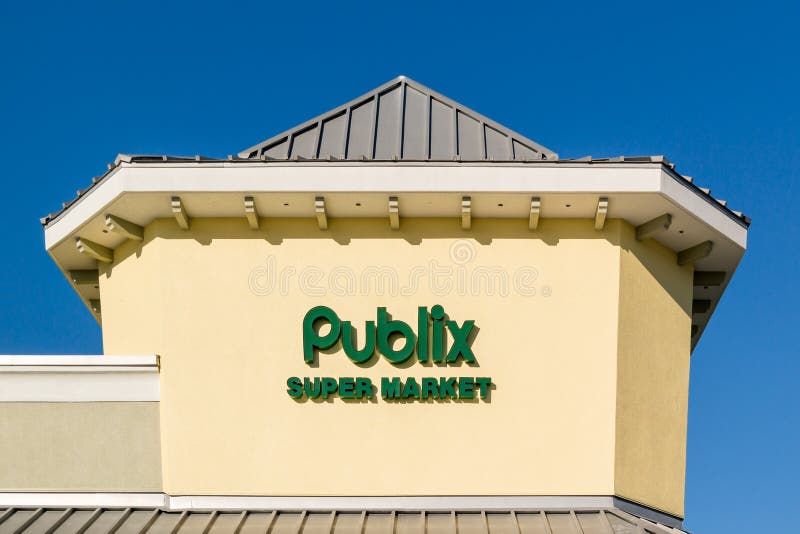 Brand name and logo of Publix supermarket chain on rooftop of store in Fort Myers, Florida, USA. Brand name and logo of Publix supermarket chain on rooftop of store in Fort Myers, Florida, USA