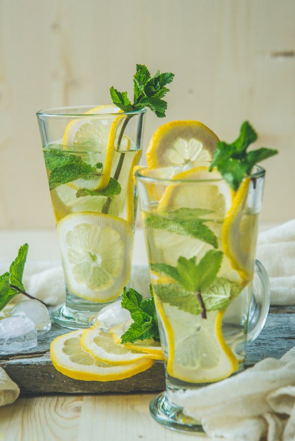 Nonalcoholic or Alcoholic Mojito Cocktail with Lemon and Mint Stock