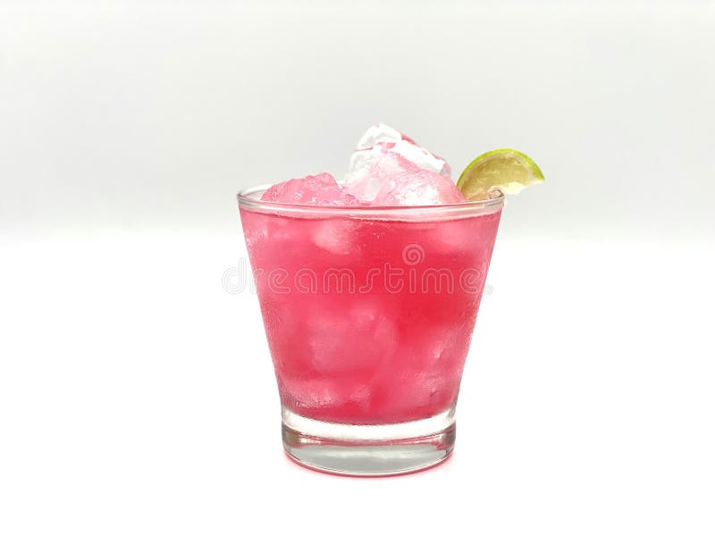 Non-alcoholic pink bomb cocktail, put in a short glass. Non-alcoholic pink bomb cocktail, put in a short glass with a slice of lemon. Sweet, tasty and