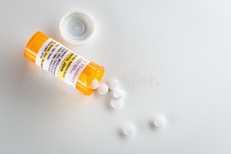 Non-Proprietary Medicine Prescription Bottle and Spilled Pills