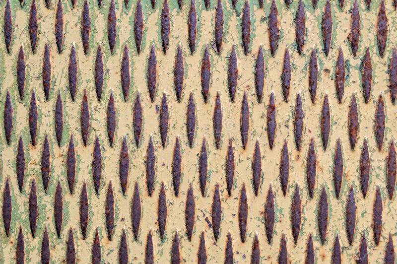 Non slip dimaond pattern on metal plate detail royalty free stock photo