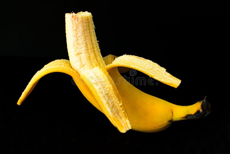 One Peeled Banana On Black Background Stock Image Image of color
