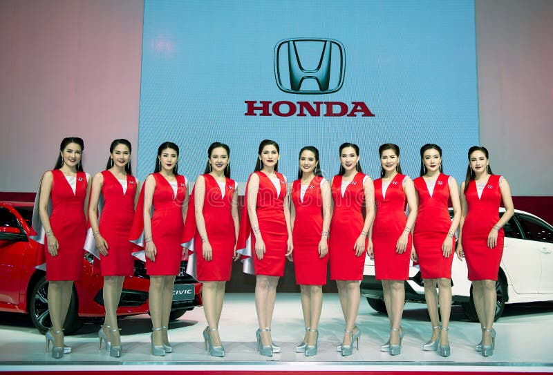 NONTHABURI, THAILAND - DECEMBER 9,2017 : View of girl models with All New Honda Civic car on booths at Thailand International Moto stock image NONTHABURI, THAILAND - DECEMBER 9,2017 : View of girl models with All New Honda Civic car on booths at Thailand International Moto stock image