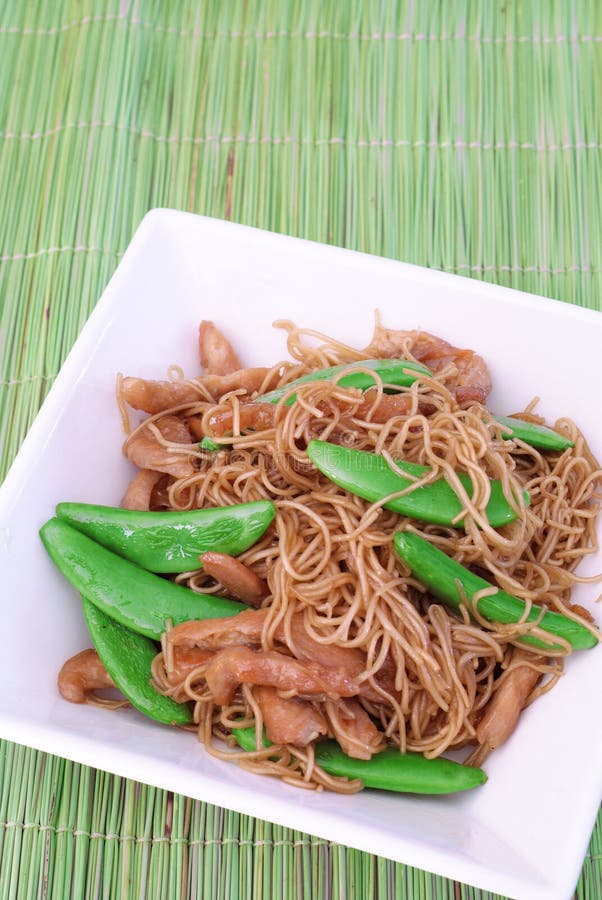 Noodles and green beans stock image. Image of peas, plate 2475873