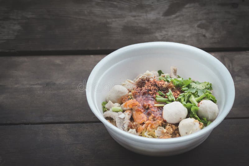 Noodles In A Styrofoam Cup On Wood Background,selective Focus. Stock