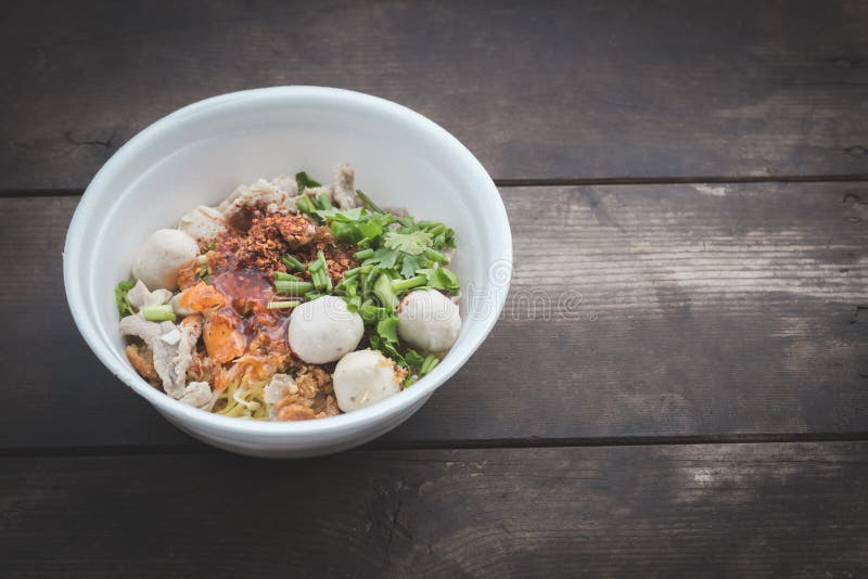 Noodles In A Styrofoam Cup On Wood Background,selective Focus. Stock
