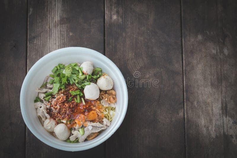 Noodles In A Styrofoam Cup On Wood Background,selective Focus. Stock