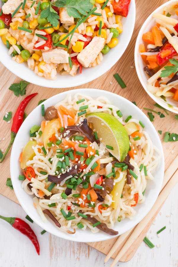 Noodles with Vegetables and Greens, Fried Rice with Tofu Stock Image