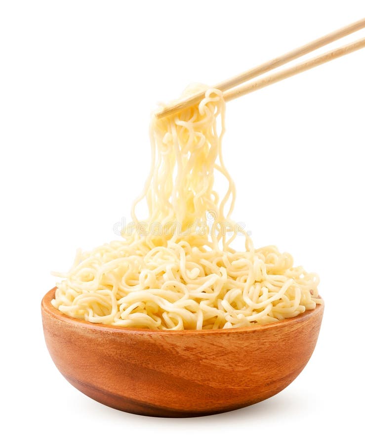 Noodles in a wooden bowl and chopsticks on a white plate. Isolated