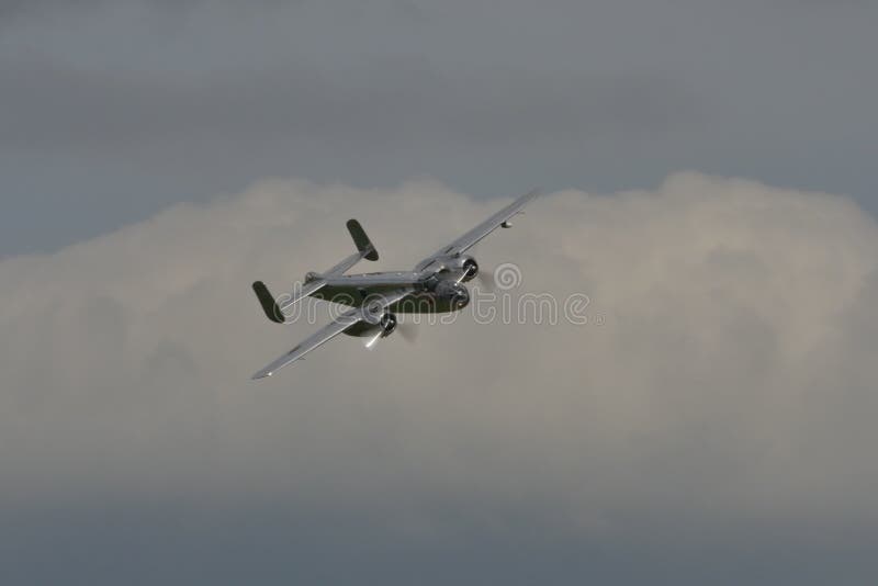 Duxford Flying Legends UK JULY, 11, 2015 North American B-25 Mitchell american bomber propeller airplane of World War 2 used in 1942 for the Doolittle Raid to bomb Tokyo and other places in Japan. Duxford Flying Legends UK JULY, 11, 2015 North American B-25 Mitchell american bomber propeller airplane of World War 2 used in 1942 for the Doolittle Raid to bomb Tokyo and other places in Japan