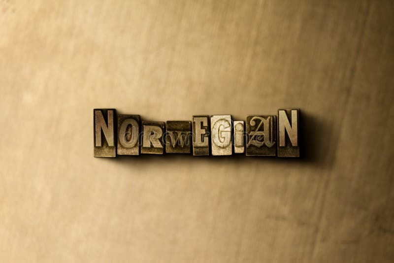 NORRMAN - närbild av det typsatta ordet för grungy tappning på metallbakgrunden royaltyfria foton NORRMAN - närbild av det typsatta ordet för grungy tappning på metallbakgrunden royaltyfria foton