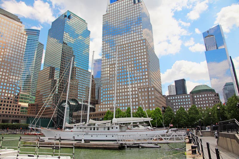 North Cove Marina At Battery Park in Manhattan, NY surrounded by mix of office buildings, residential housing and retail stores. North Cove Marina At Battery Park in Manhattan, NY surrounded by mix of office buildings, residential housing and retail stores.