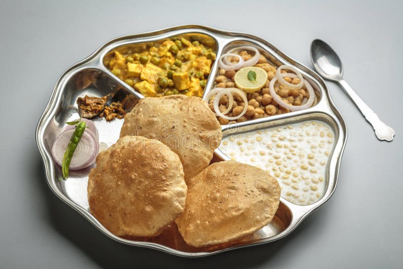 North indian food served in a plate or thali