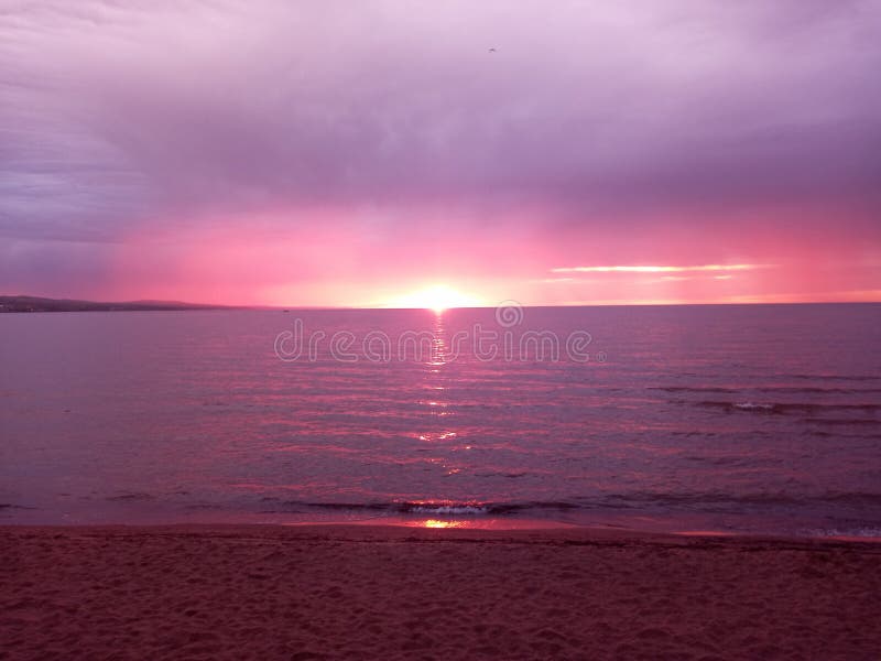 North shore Beach sunrise stock image. Image of sunset 236095195