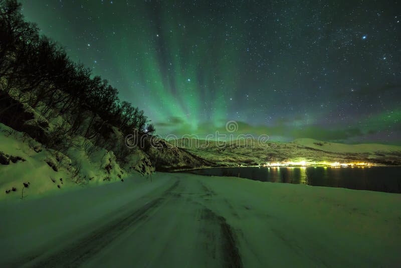 Northern lights Aurora Borealis in the night above a arctic snow royalty free stock image Northern lights Aurora Borealis in the night above a arctic snow royalty free stock image