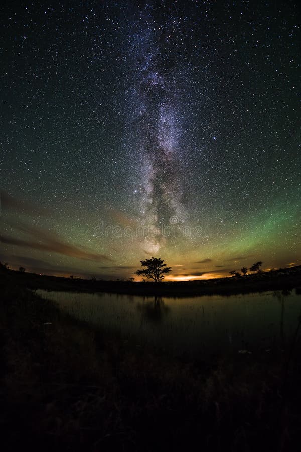 The Northern Lights were visible all the way down to southern Ã–land and competed with the Milky Way for attention. This image is composed of five photos taken with a 12mm fisheye and merged in photoshop to reduce noise. The Northern Lights were visible all the way down to southern Ã–land and competed with the Milky Way for attention. This image is composed of five photos taken with a 12mm fisheye and merged in photoshop to reduce noise.