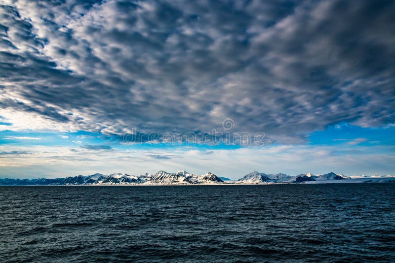 Norway landscape ice nature of the glacier mountains of Spitsbergen Longyearbyen Svalbard arctic ocean winter polar day sunset sky stock images Norway landscape ice nature of the glacier mountains of Spitsbergen Longyearbyen Svalbard arctic ocean winter polar day sunset sky stock images