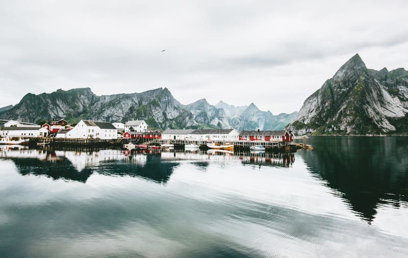 Norway village and mountains rocks over fjord