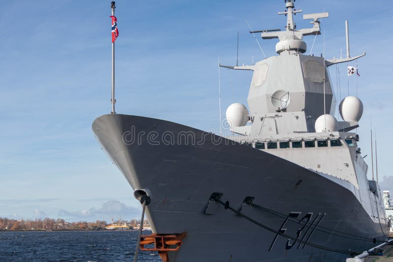 Norwegian army warship from the front. A military ship is moored in the port of Riga. Royal Norwegian Navy, Fridtjof Nansen-class