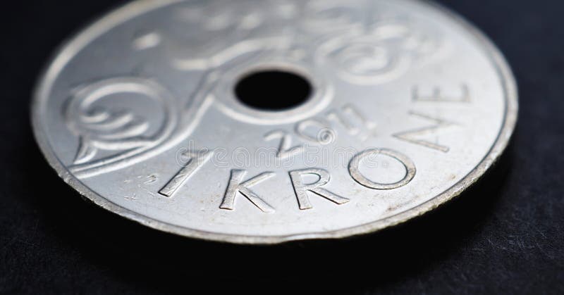 1 Norwegian krone coin close-up. National currency of Norway. Money illustration for news about economy or finance. Bank and loan. Savings and interest. Kroner and Norges Bank. Horizontal stories