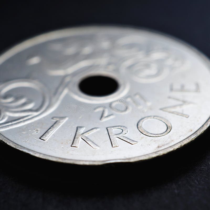 1 Norwegian krone coin close up. National currency of Norway. Money square illustration for news about economy or finance. Banking and credit. Wages and taxes. Crown and Norges Bank. Macro