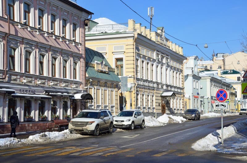 Noscow, Russia, March, 06, 2018. Cars parked on the side of the road prevent from clearing the road from snow on street Podsosensk royalty free stock image Noscow, Russia, March, 06, 2018. Cars parked on the side of the road prevent from clearing the road from snow on street Podsosensk royalty free stock image