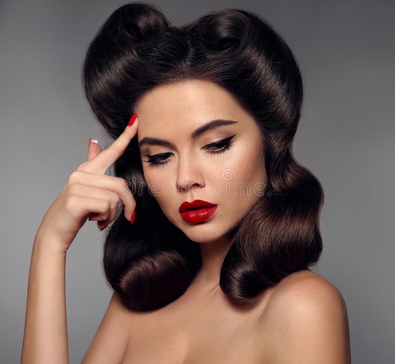 Nostalgia. Pin Up Girl with Red Lips Makeup and Retro Curls Hair