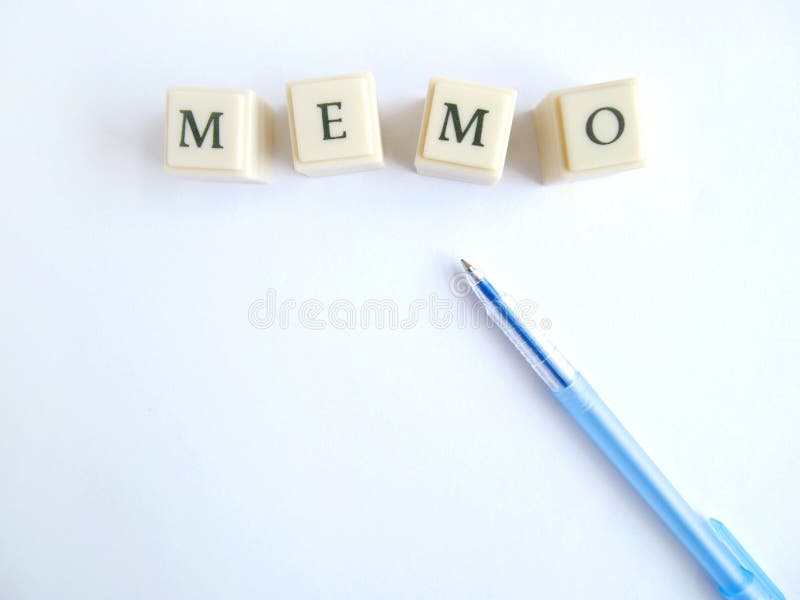 A concept photograph with the word memo spelt out in blocks, taken with white background with copy space. Conceptual photo for taking down of notes for reminder purposes. Nobody in picture.