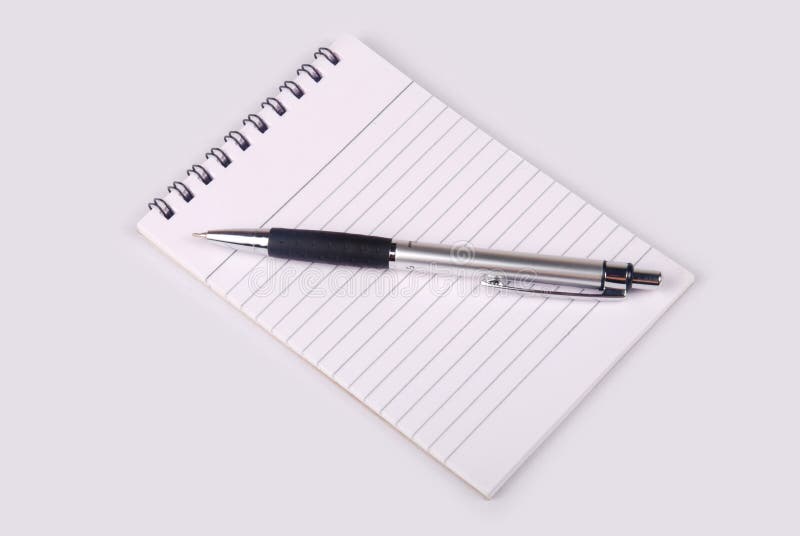 Note book with pen royalty free stock photos