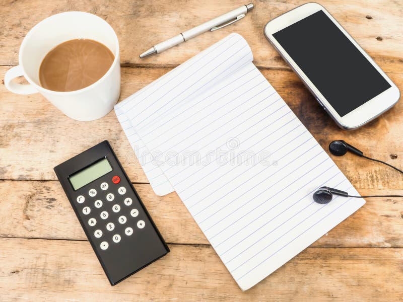 Note Pad, Calculator and Coffee Stock Photo Image of cell, table