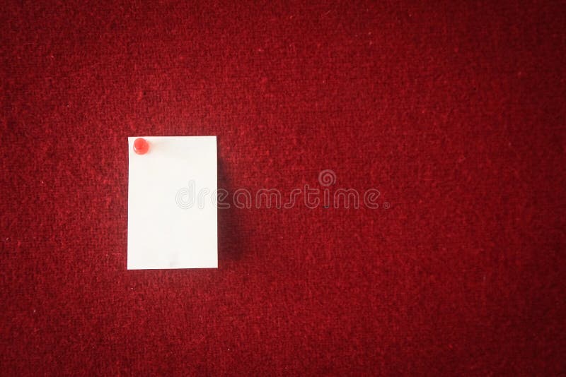 Note paper pinned on a red board ready for filling in quotes.