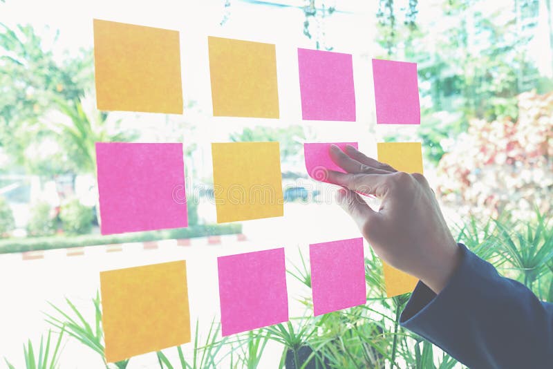 Note paper reminder schedule board. Business people meeting and use post it notes to share idea. Discussing - business, teamwork, brainstorming concept royalty free stock image Note paper reminder schedule board. Business people meeting and use post it notes to share idea. Discussing - business, teamwork, brainstorming concept royalty free stock image