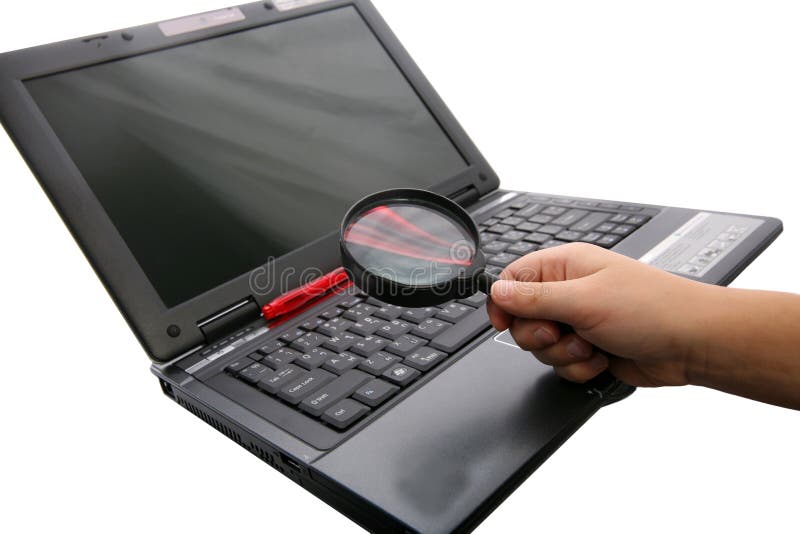 Notebook with pen hand and with magnifying glass - Office work place