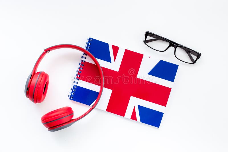 Notebook with British Flag and Headphones. English Lessons Concept