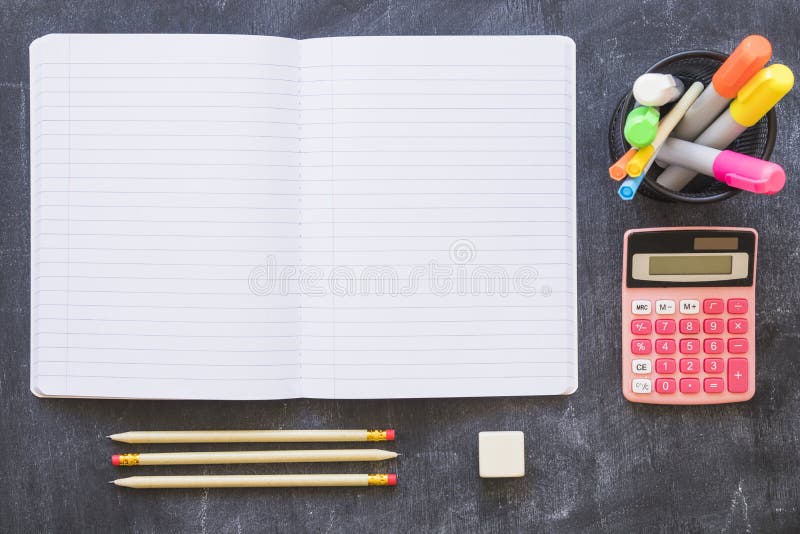 Notebook calculator stationery blackboard. High quality photo royalty free stock image