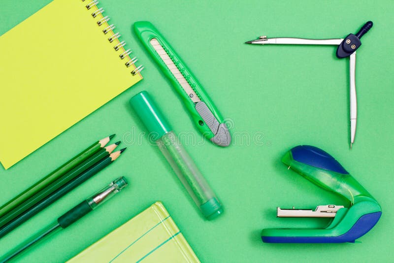 Notebook, color pencils, pen, book, felt-tip pen, paper knife, c stock photo