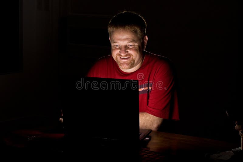 Notebook Computer User Smiling