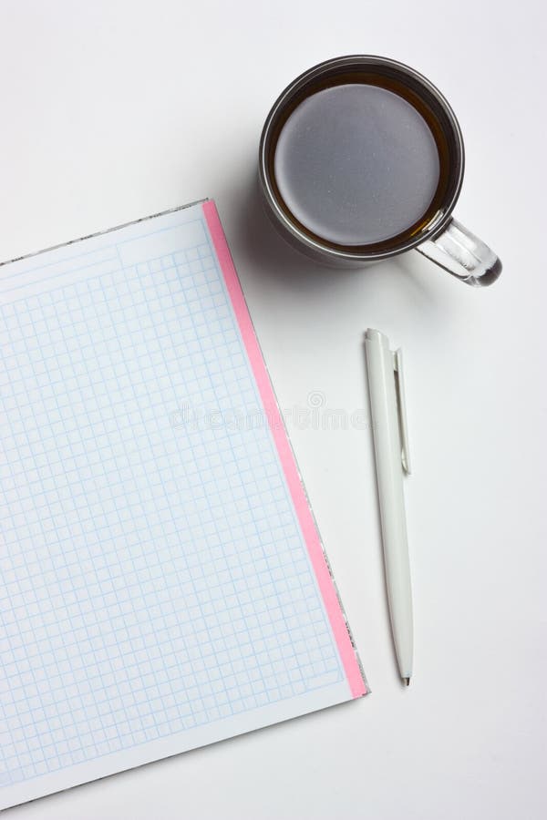 Notebook and a cup coffee